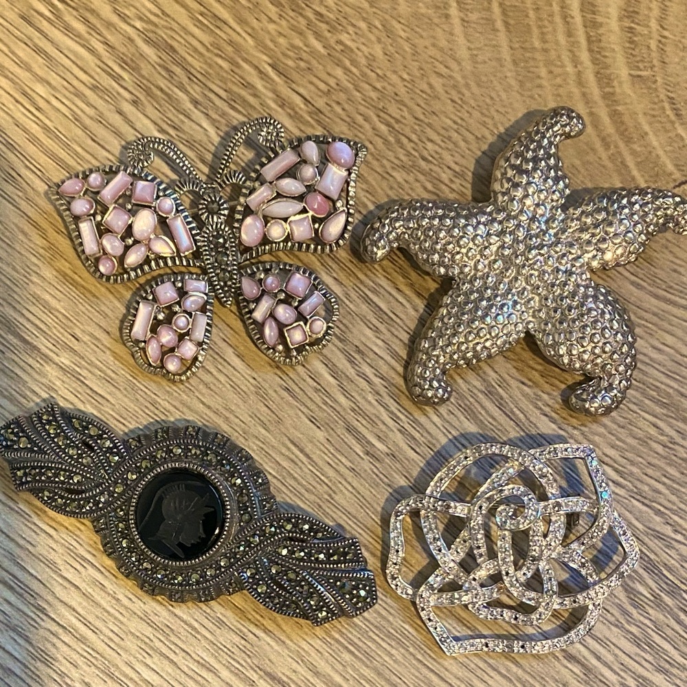 4 Sterling silver brooches